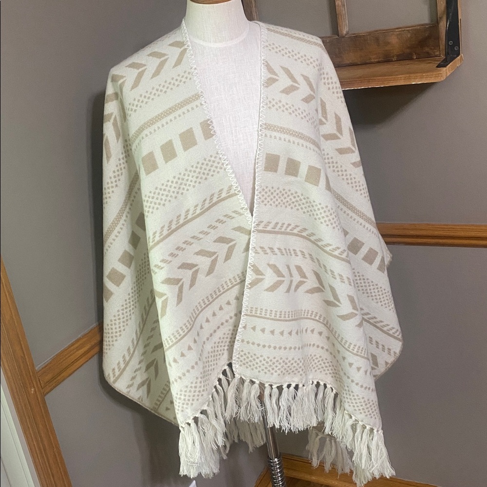 Francesca’s tan/cream reversible Open Front Fringe Poncho Shawl Cardigan.